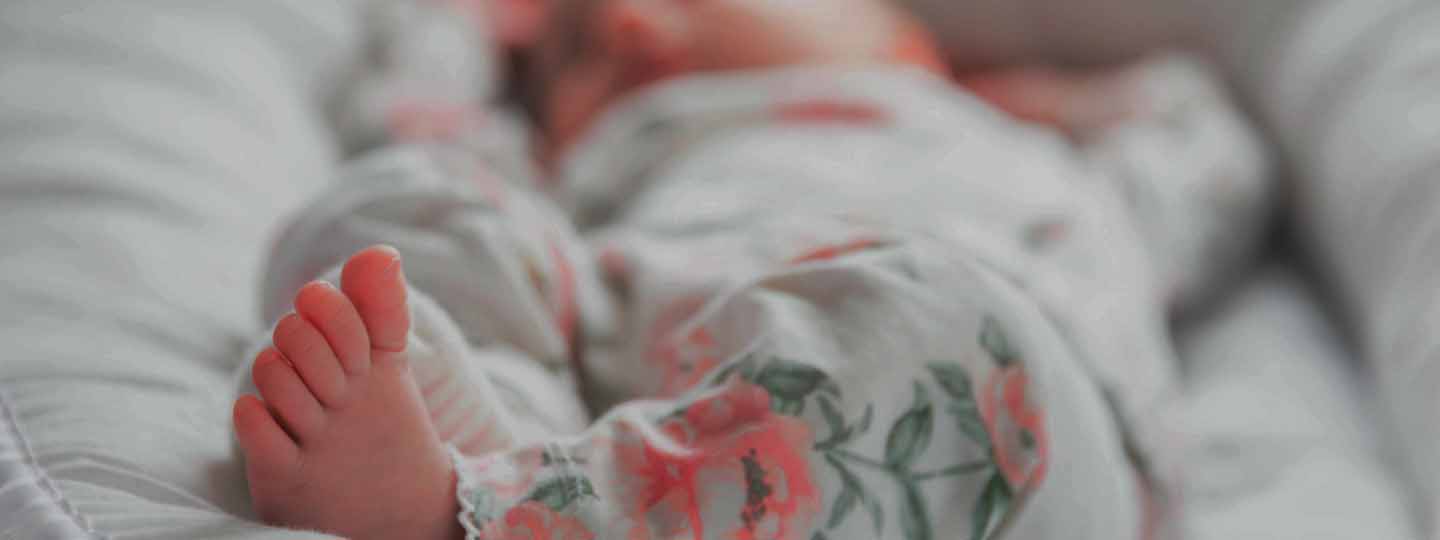 Can a woman give Adhan to a newborn baby?