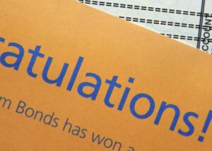 Congratulatory letter for winning premium bond prize.